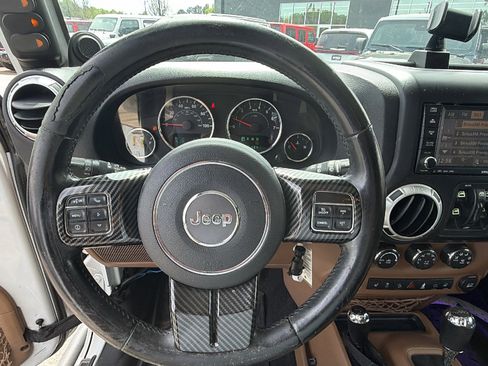 Used 2012 Jeep Wrangler Unlimited Sahara w/ Dual Top Group AWD/4WD image 25