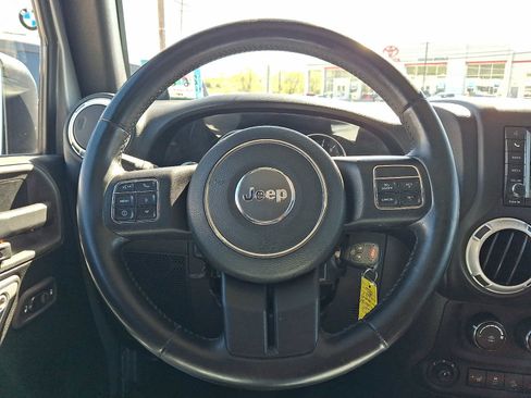 Used 2014 Jeep Wrangler Unlimited Sahara w/ Dual Top Group AWD/4WD image 17