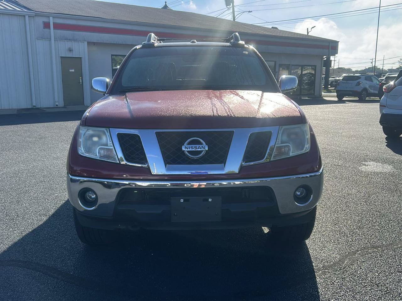 Used 2012 Nissan Frontier SL AWD/4WD image 2