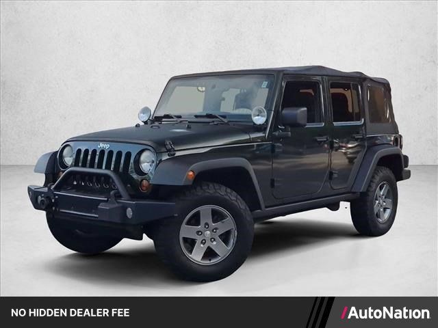Used 2011 Jeep Wrangler Unlimited Rubicon w/ Connectivity Group AWD/4WD image 1