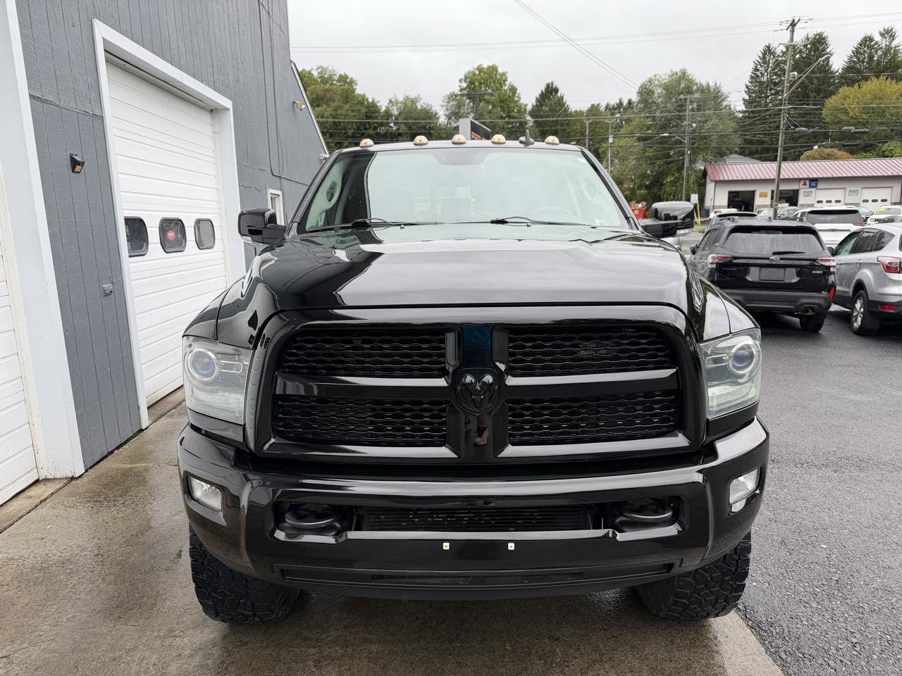 Used 2014 RAM 2500 Laramie w/ Black Appearance Group AWD/4WD image 2