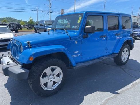 Used 2011 Jeep Wrangler Unlimited Sahara w/ Dual Top Group AWD/4WD image 4