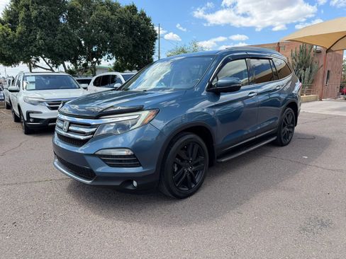 Used 2016 Honda Pilot Touring image 1