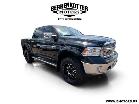 Used 2014 RAM 1500 Laramie AWD/4WD image 1