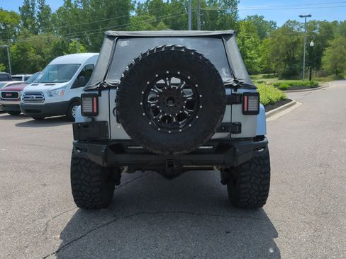 Used 2014 Jeep Wrangler Unlimited Sahara w/ Dual Top Group AWD/4WD image 7