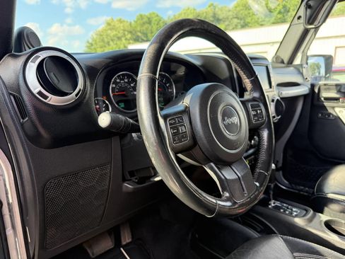 Used 2014 Jeep Wrangler Sahara w/ Dual Top Group AWD/4WD image 17