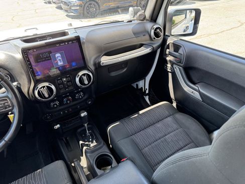 Used 2012 Jeep Wrangler Unlimited Sahara w/ Dual Top Group AWD/4WD image 25