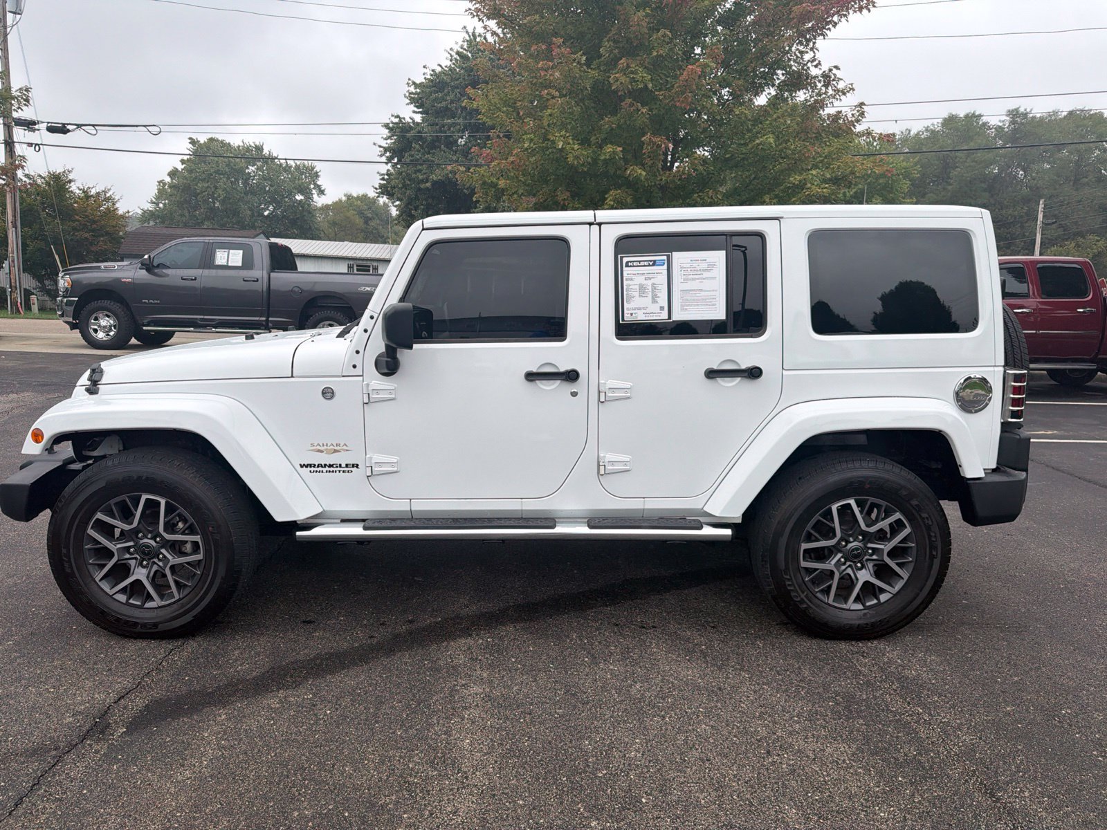 Used 2013 Jeep Wrangler Unlimited Sahara w/ Mopar Chrome Edition Group AWD/4WD image 2