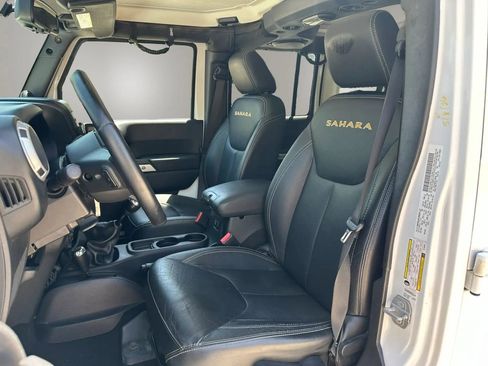 Used 2014 Jeep Wrangler Unlimited Sahara w/ Dual Top Group AWD/4WD image 22