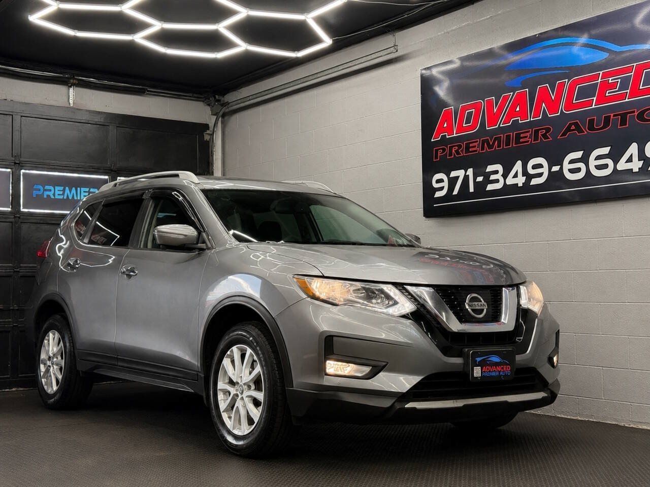Used 2017 Nissan Rogue SV w/ Sun & Sound Touring Package AWD/4WD image 1