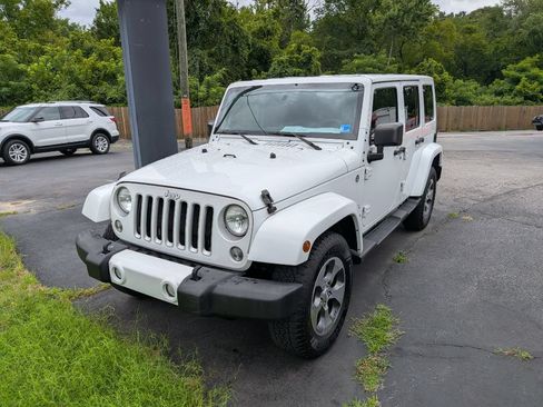 Used 2016 Jeep Wrangler Unlimited Sahara w/ Connectivity Group AWD/4WD image 1