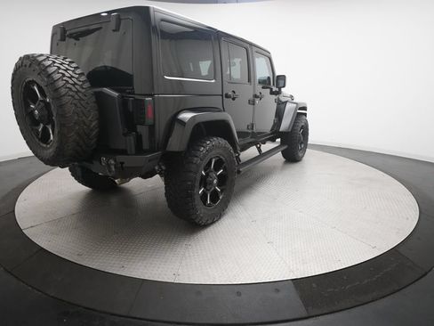 Used 2014 Jeep Wrangler Unlimited Rubicon w/ Dual Top Group AWD/4WD image 13