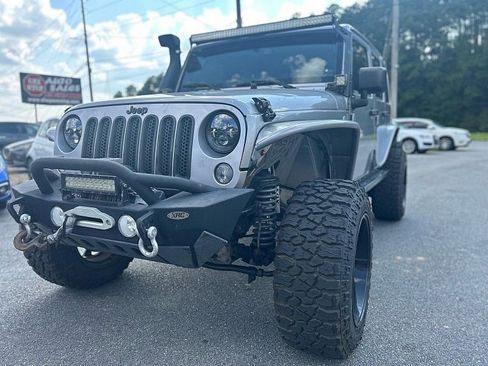 Used 2014 Jeep Wrangler Unlimited Sahara w/ Max Tow Package image 2