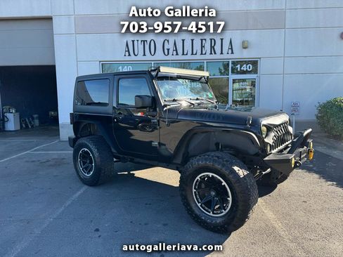 Used 2015 Jeep Wrangler Sport image 1