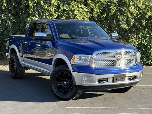 Used 2014 RAM 1500 Laramie w/ Convenience Group AWD/4WD image 1