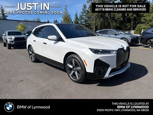 Used 2024 BMW iX xDrive50 w/ Premium Package AWD/4WD image 1