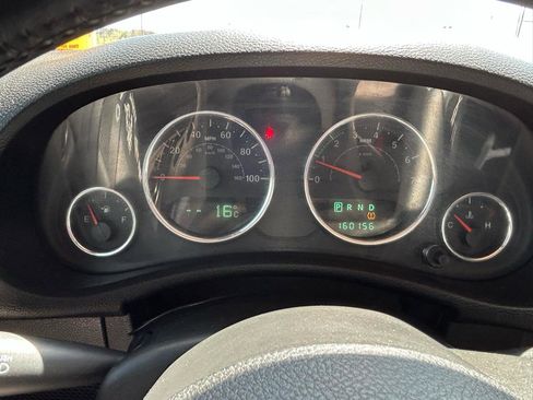 Used 2012 Jeep Wrangler Sahara w/ Dual Top Group AWD/4WD image 19