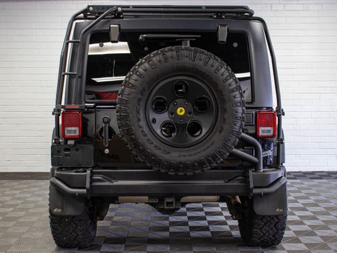 Used 2013 Jeep Wrangler Unlimited Rubicon w/ Dual Top Group AWD/4WD image 4