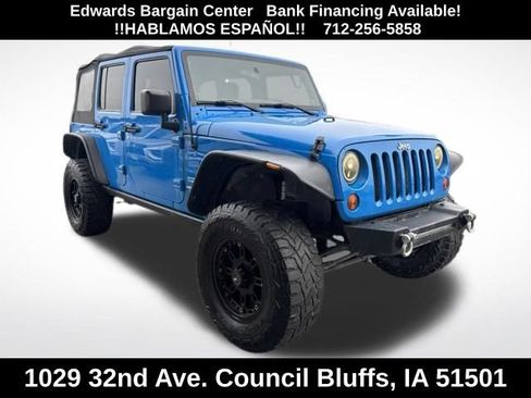 Used 2011 Jeep Wrangler Unlimited Sport AWD/4WD image 1