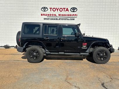 Used 2014 Jeep Wrangler Unlimited Sahara w/ Dual Top Group