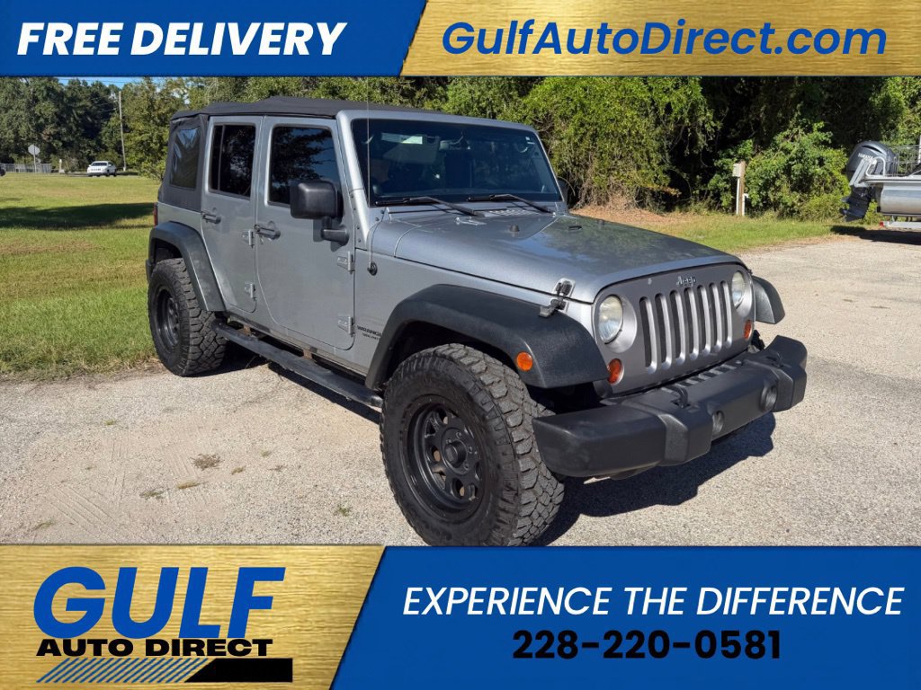 Used 2013 Jeep Wrangler Unlimited Sport AWD/4WD image 1