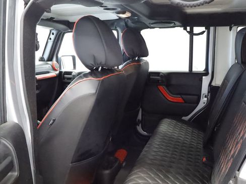 Used 2013 Jeep Wrangler Unlimited Sahara w/ Dual Top Group AWD/4WD image 18