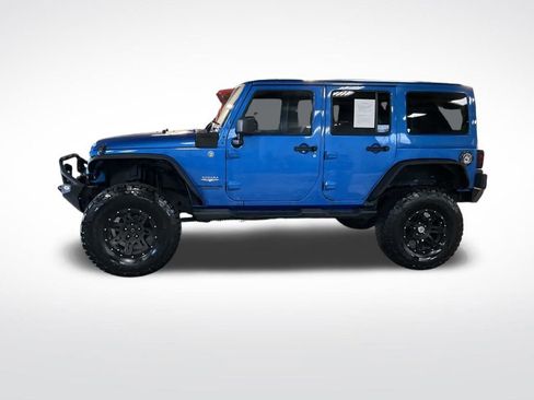 Used 2014 Jeep Wrangler Unlimited Sahara w/ Dual Top Group image 2