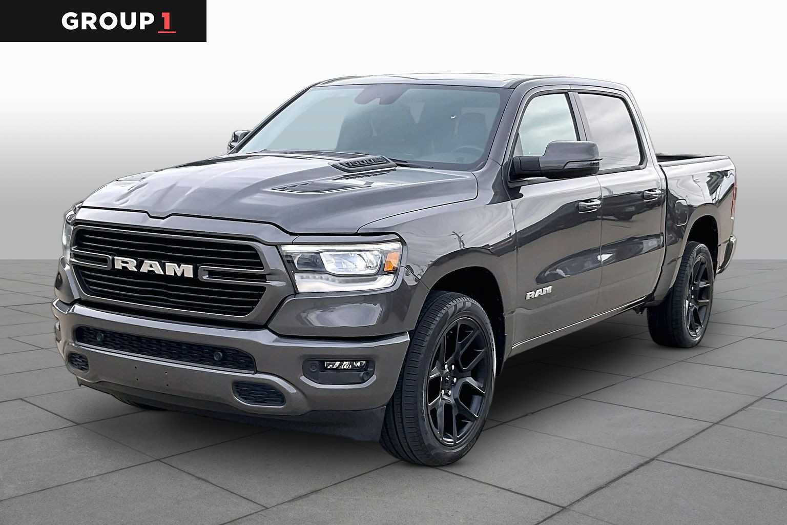 Used 2023 RAM 1500 Laramie AWD/4WD image 1
