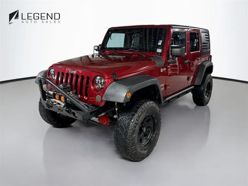 Used 2012 Jeep Wrangler Unlimited Sport AWD/4WD image 1