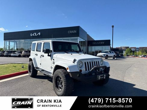 Used 2013 Jeep Wrangler Unlimited Sahara w/ Connectivity Group AWD/4WD image 1