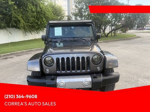 Used 2014 Jeep Wrangler Unlimited Sahara w/ Max Tow Package AWD/4WD image 1