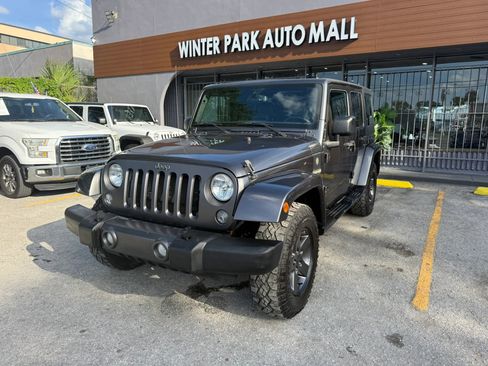 Used 2016 Jeep Wrangler Unlimited Sport AWD/4WD image 1