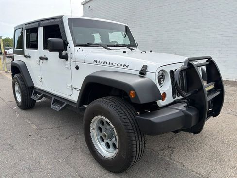 Used 2011 Jeep Wrangler Unlimited Rubicon w/ Dual Top Group AWD/4WD image 8