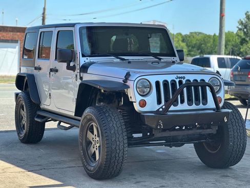 Used 2012 Jeep Wrangler Unlimited Sport AWD/4WD image 1