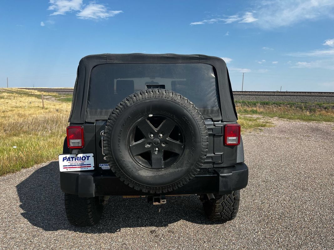 Used 2010 Jeep Wrangler Sahara w/ Dual Top Group AWD/4WD image 3