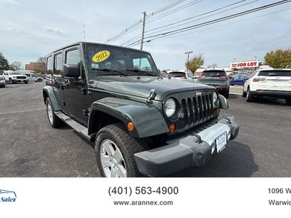 Used 2012 Jeep Wrangler Unlimited Sahara w/ Dual Top Group