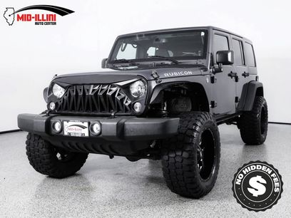 Used 2014 Jeep Wrangler Unlimited Rubicon w/ Dual Top Group