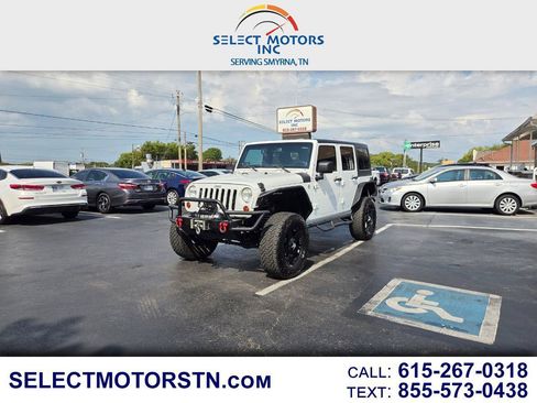 Used 2013 Jeep Wrangler Unlimited Sport AWD/4WD image 1