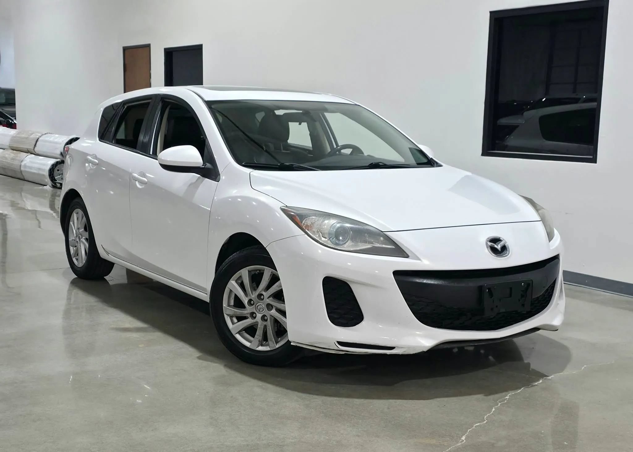 Used 2012 MAZDA MAZDA3 i Grand Touring w/ Tech Pkg FWD image 1