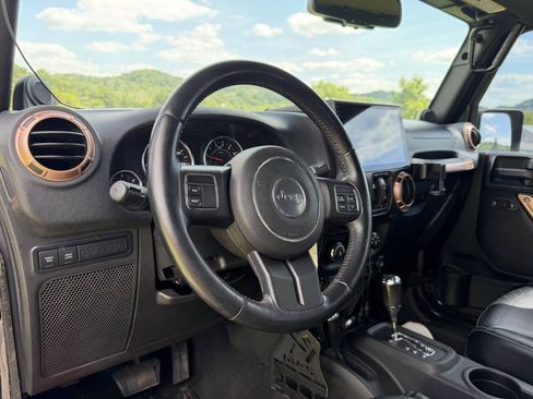 Used 2014 Jeep Wrangler Unlimited Rubicon w/ Dual Top Group AWD/4WD image 21
