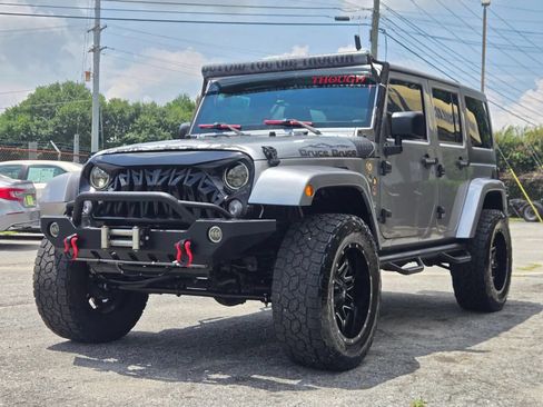 Used 2016 Jeep Wrangler Unlimited Sahara w/ Dual Top Group AWD/4WD image 2