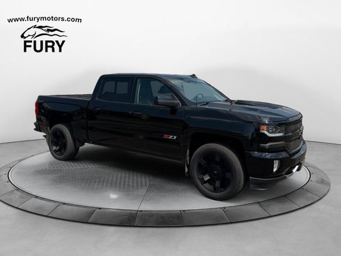 Used 2017 Chevrolet Silverado 1500 LTZ Z71 w/ Realtree Edition AWD/4WD image 1