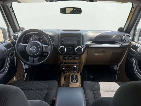 Used 2012 Jeep Wrangler Unlimited Sahara w/ Dual Top Group AWD/4WD image 14