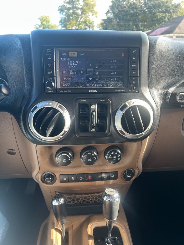 Used 2012 Jeep Wrangler Unlimited Sahara w/ Dual Top Group AWD/4WD image 15