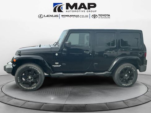 Used 2011 Jeep Wrangler Unlimited 70th Anniversary w/ Dual Top Group AWD/4WD image 2