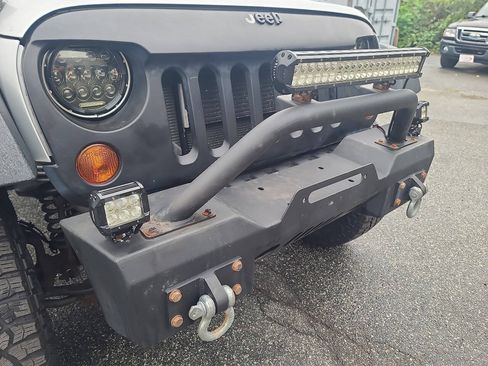 Used 2012 Jeep Wrangler Unlimited Sport w/ Dual Top Group AWD/4WD image 24