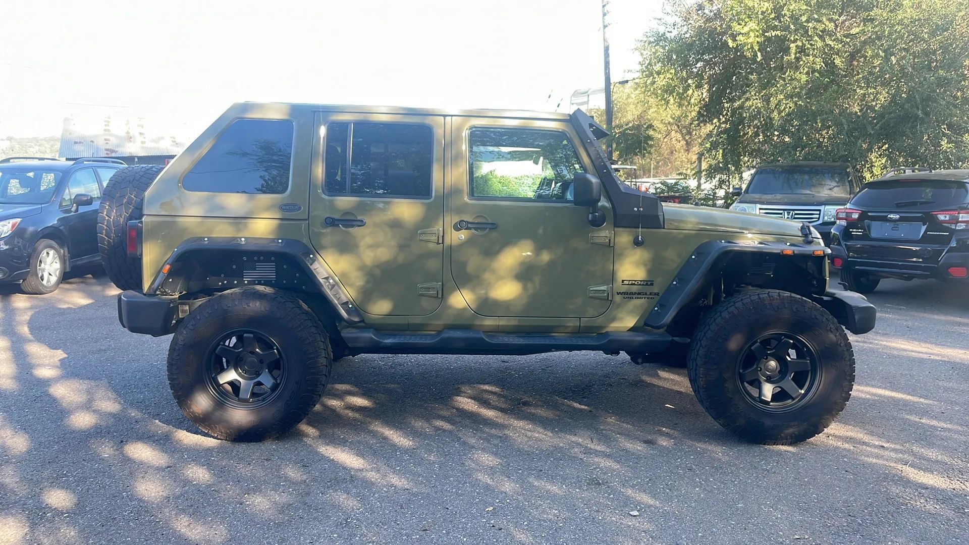 Used 2013 Jeep Wrangler Unlimited Sport AWD/4WD image 9