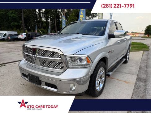 Used 2014 RAM 1500 Laramie w/ Convenience Group AWD/4WD image 1