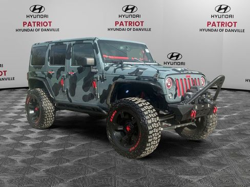 Used 2014 Jeep Wrangler Unlimited Sahara w/ Connectivity Group AWD/4WD image 1