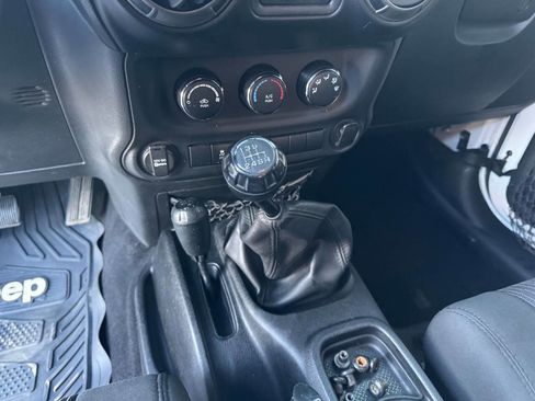 Used 2012 Jeep Wrangler Unlimited Sport w/ Black Appearance Group image 12